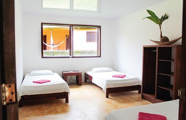 Room with double bed, two single beds